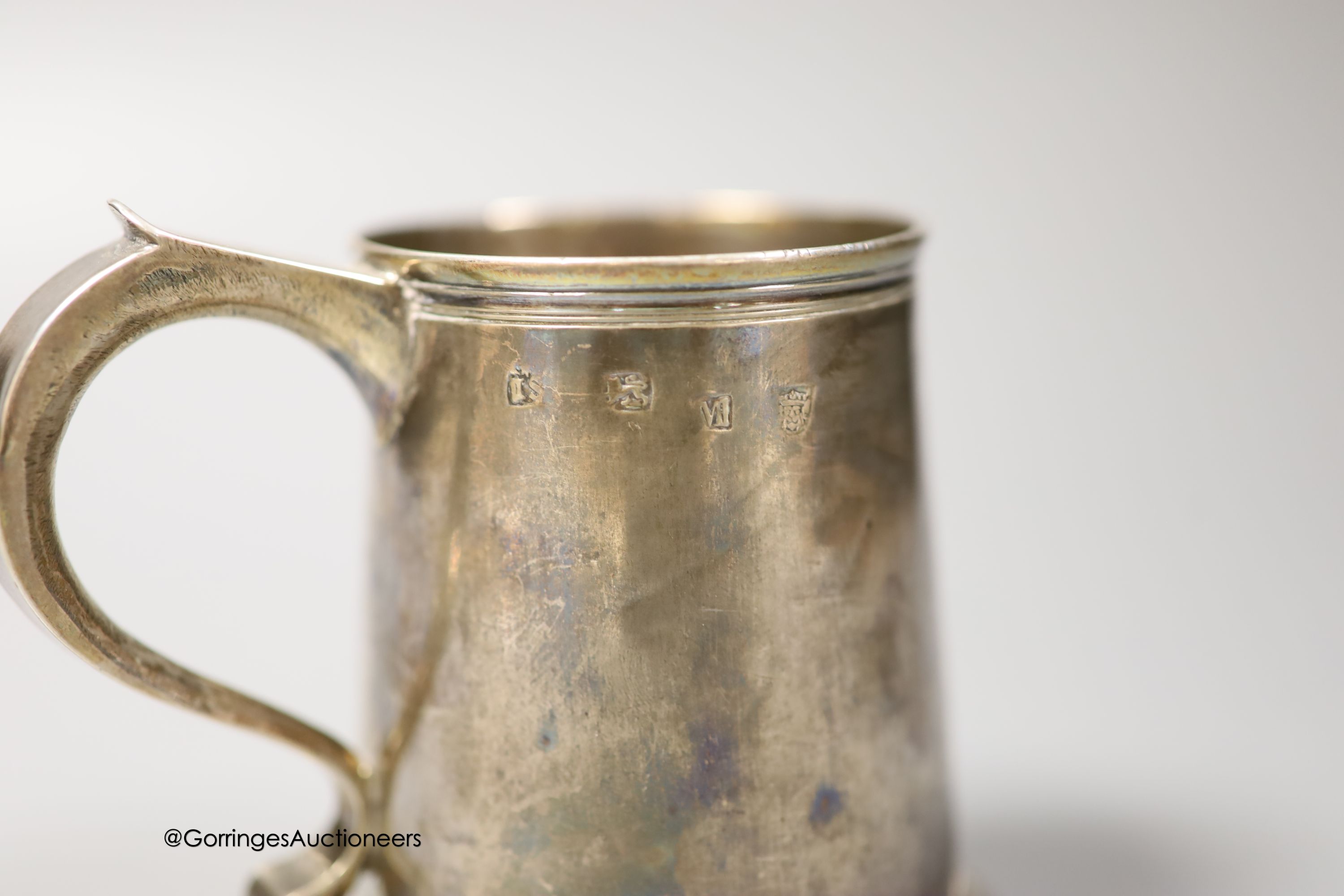 An early George II silver small mug, by James Smith I, London, 1727, height 92mm, 156 grams (a.f.)